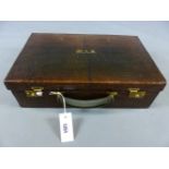 A CROCODILE LEATHER DRESSING CASE, STAMPED FINNIGANS LTD, MANCHESTER. PART FITTED WITH GLASS AND