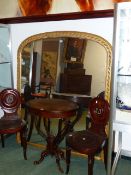 A LARGE VICTORIAN GILT FRAMED OVERMANTLE MIRROR. APPROX 135CMS WIDE X 160CMS HIGH.