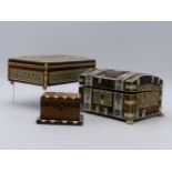 AN EARLY 20TH.C.TORTOISESHELL AND IVORY MOUNTED DOME TOP CASKET ON CARVED PAW FEET TOGETHER WITH TWO