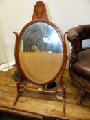 AN EARLY 19TH.C.SATINWOOD AND INLAID SWING TOILET MIRROR.