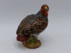 A MEISSEN FIGURE OF A GROUSE WITH POLYCHROME DECORATION. 9CMS HIGH