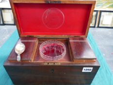 AN EARLY 19TH.C.MAHOGANY TEA CADDY WITH FITTED INTERIOR, GLASS MIXING BOWL AND A HALLMARKED SILVER