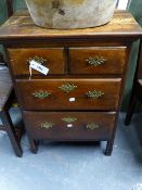 AN UNUSUAL SMALL 18TH.C.FRUITWOOD SMALL CHEST OF TWO SHORT AND TWO LONG DRAWERS. 60X83CMS.