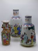 A PAIR OF UNUSUAL FAMILLE ROSE MALLET FORM VASES WITH FIGURAL DECORATION, HEIGHT 31CMS TOGETHER WITH