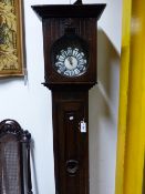 AN ANTIQUE FRENCH COUNTRY OAK LONG CASE CLOCK CASE TOGETHER WITH A FRENCH COMTOISE CLOCK MOVEMENT