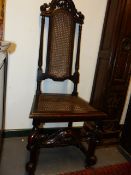 AN ANTIQUE CAROLEAN STYLE HIGH BACK SIDE CHAIR.