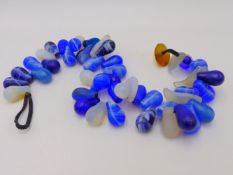 A QUANTITY OF AFRICAN GLASS TRADE BEADS.