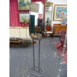 AN ART DECO CHROME MIRROR ON STAND.