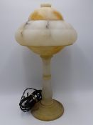 AN ART DECO ALABASTER TABLE LAMP AND SHADE WITH BAULSTER COLUMN.