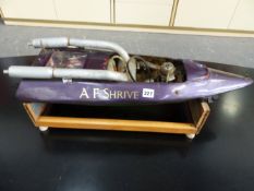 A HAND MADE REMOTE CONTROL MODEL SPEED BOAT.