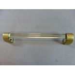 AN ART DECO BRASS MOUNTED GLASS TOWL RAIL