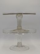 FOUR ANTIQUE FOOTED GLASSD TAZZAS, THE LARGEST 30CMS DIAMETER.