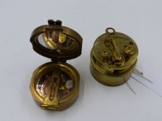 A BRASS CASED POCKET SEXTANT WITH SCREW-OFF COVER TOGETHER WITH A BRASS CASED COMPASS MARKED STANLEY