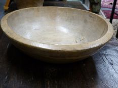 AN ANTIQUE SYCAMORE LARGE TURNED BOWL. DIA. 50cms.