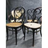 THREE VINTAGE THONET BENTWOOD CAFE CHAIRS WITH CANE SEATS AND A SIMILAR CANE SEAT AND BACK ARMCHAIR,