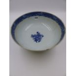 A CHINESE EXPORT BLUE AND WHITE DEEP BOWL WITH FLORAL SPRAY DECORATION. DIA.28.5cms.