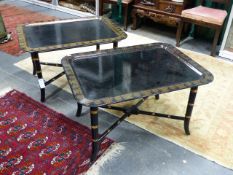 A PAIR OF LACQUER REGENCY STYLE TRAY TABLES, GILT CLASSICAL STYLE BORDERS AND FAUX BAMBOO BASES.