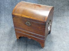 A GEORGIAN INLAID MAHOGANY DOME TOP CELLARETTE WITH BRASS CARRYING HANDLES ON HIGH BRACKET FEET. W.