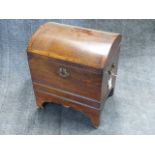 A GEORGIAN INLAID MAHOGANY DOME TOP CELLARETTE WITH BRASS CARRYING HANDLES ON HIGH BRACKET FEET. W.