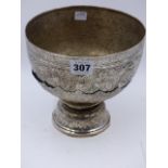 A MIDDLE EASTERN SILVER COLOURED PEDESTAL BOWL ON STAND. DIA.18.5cms x H.17cms. WEIGHT APPROX 16ozs.