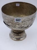 A MIDDLE EASTERN SILVER COLOURED PEDESTAL BOWL ON STAND. DIA.18.5cms x H.17cms. WEIGHT APPROX 16ozs.