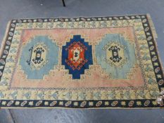 A TURKISH TRIBAL RUG. 206 x 133cms.