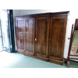 A VICTORIAN MAHOGANY GEORGIAN STYLE BREAKFRONT WARDROBE/LINEN PRESS, MOULDED CORNICE ABOVE FOUR FULL