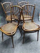 A SET OF FOUR UNUSUAL VINTAGE BENTWOOD THONET CHAIRS WITH ELONGATED BALLOON SEATS AND CRISS CROSS