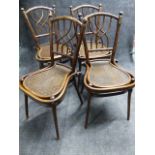 A SET OF FOUR UNUSUAL VINTAGE BENTWOOD THONET CHAIRS WITH ELONGATED BALLOON SEATS AND CRISS CROSS