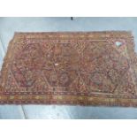 AN ANTIQUE CAUCASIAN RUG 153 x 123cms TOGETHER WITH AN ANTIQUE PERSIAN SHIRAZ RUG. 212 x 122cms.