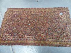 AN ANTIQUE CAUCASIAN RUG 153 x 123cms TOGETHER WITH AN ANTIQUE PERSIAN SHIRAZ RUG. 212 x 122cms.