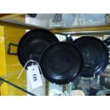 A GROUP OF THREE ANTIQUE GREEK ATTIC BLACK POTTERY SHALLOW BOWLS OR KYLIX WITH SHAPED LOOP HANDLES