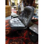 A DANISH RETRO BROWN LEATHER BUTTON BACK AND SEAT SWIVEL CHAIR WITH ROSEWOOD STAR SHAPED BASE. BY