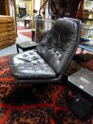 A DANISH RETRO BROWN LEATHER BUTTON BACK AND SEAT SWIVEL CHAIR WITH ROSEWOOD STAR SHAPED BASE. BY