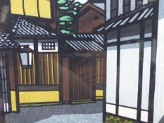 20th.C. JAPANESE SCHOOL PENCIL SIGNED COLOUR WOODBLOCK PRINT OF A STREET SCENE. 28 x 69cms.