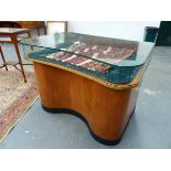 A PAIR OF VINTAGE FLAT TOP GLAZED SHOP DISPLAY CABINETS OF SHAPED FORM WITH MULTI DRAWER PEDESTALS