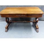 A LATE REGENCY ROSEWOOD LIBRARY TABLE WITH APRON DRAWER AND LYRE END SUPPORTS ON PAW FEET. W.