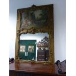 A CARVED AND PAINTED FRENCH LOUIS XV STYLE TRUMEAU MIRROR WITH SHAPED SCENE AFTER BOUCHER ABOVE