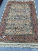 A PERSIAN RUG OF UNUSUAL TILE PATTERN DESIGN. 210 x 134cms.