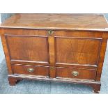 A GEORGIAN OAK AND MAHOGANY PANEL FRONT MULE CHEST WITH SINGLE DEEP BASE DRAWER ON BRACKET FEET. W.