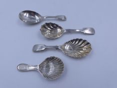 TWO SILVER HALLMARKED AND TWO WHITE METAL CADDY SPOONS OF VARIOUS STYLES AND DATES TO INCLUDE AN
