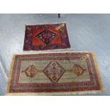 AN UNUSUAL PERSIAN SERAB SMALL RUG. 138 x 60cms TOGETHER WITH AN ANTIQUE AFSHAR BAG FACE.