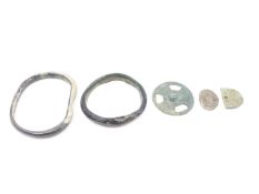 TWO ANTIQUE ROMAN GLASS BANGLES TOGETHER WITH A ROMAN STRAP DIVIDER AND FITTINGS.