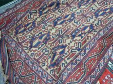 A TRIBAL SOUMAK RUG WITH FLAT WOVEN ENDS. 260 x 175cms.