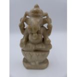 AN INDIAN CARVED MARBLE FIGURE OF GANESH. H.20cms.
