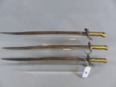 THREE 19th.C. FRENCH BRASS HILTED BAYONETS