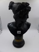 A BUST OF ATLANTA AFTER THE ANTIQUE, INSCRIBED ON REVERSE, TURNED SOCLE. H.40cms.