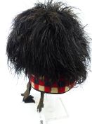 A SCOTTISH MILITARY HIGHLANDS REGIMENT FEATHER BONNET.