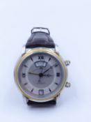 A MAURICE LACROIX MASTERPIECE ALARM, MECHANICAL AUTOMATIC WINDING, STEEL AND 18ct. GOLD WATCH ON A