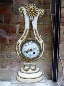 AN ANTIQUE FRENCH WHITE MARBLE ORMOLU MOUNTED LYRE FORM CLOCK IN THE LOUIS XV STYLE. H.41cms.